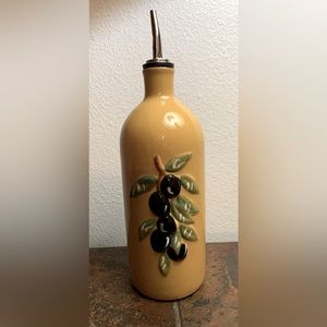 Oil and vinegar dressing bottle, never used as such. Decorative piece as well.